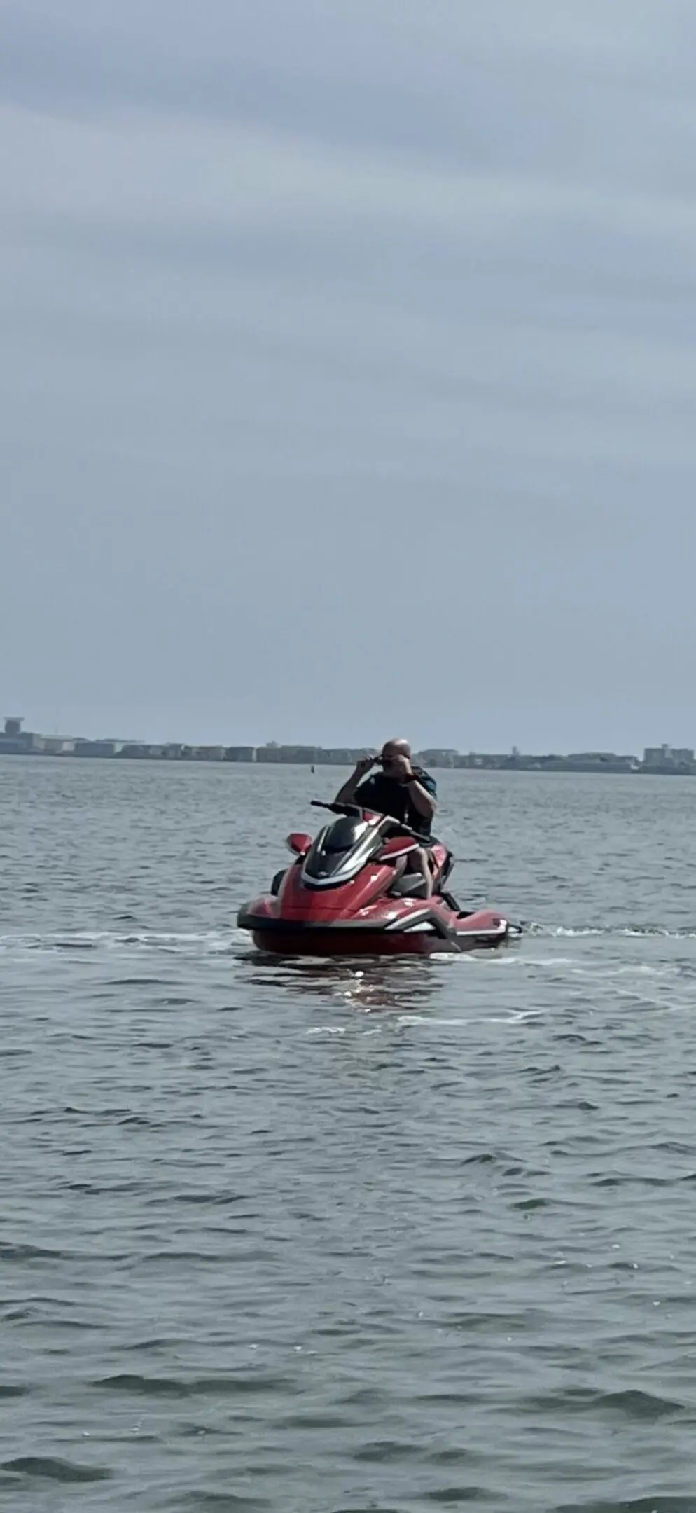 A person on a jet ski in the water.