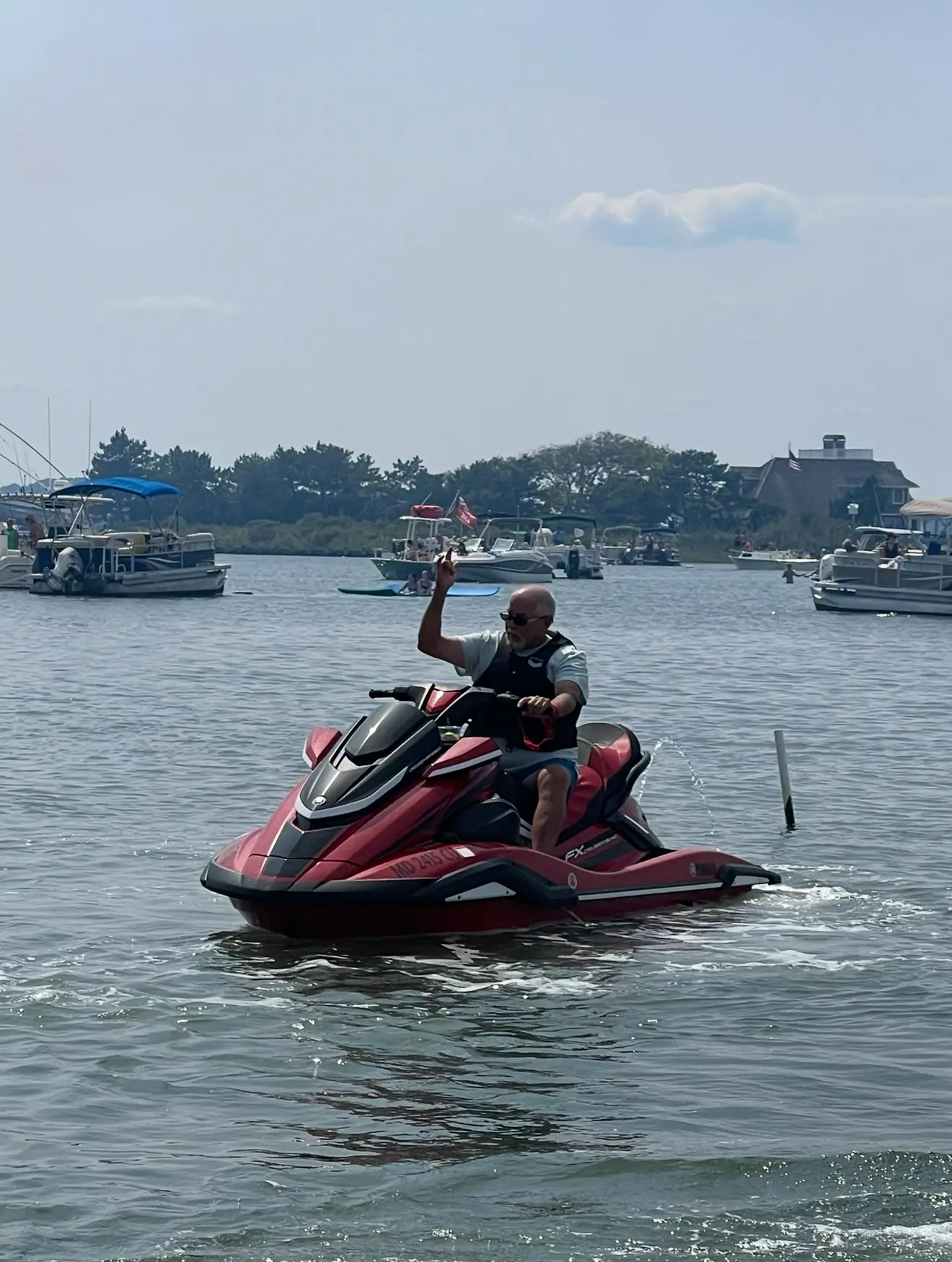 A man on a jet ski in the water.